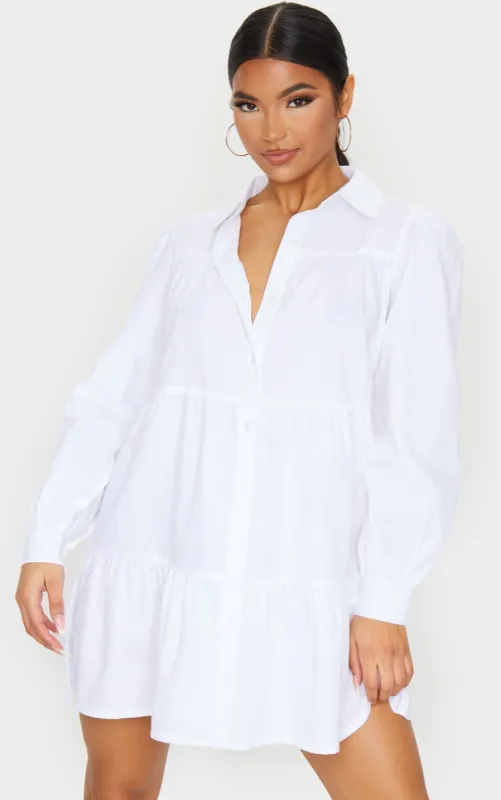 White Long Sleeve Tiered Shirt Dress sold by Pretty Little Thing