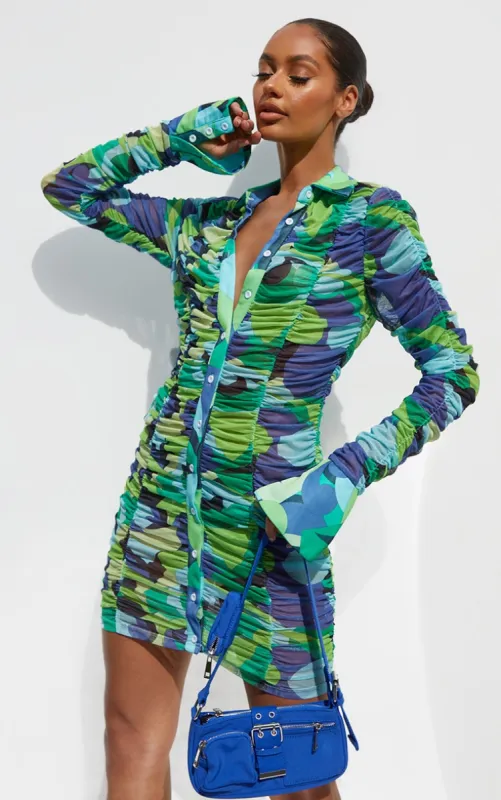 Green Abstract Print Mesh Ruched Oversized Cuff Shirt Dress sold by Pretty Little Thing