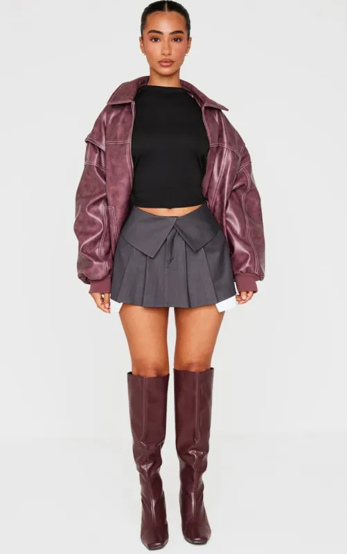 Petite Charcoal Tailored Woven Foldover Detail Mini Skirt sold by Pretty Little Thing