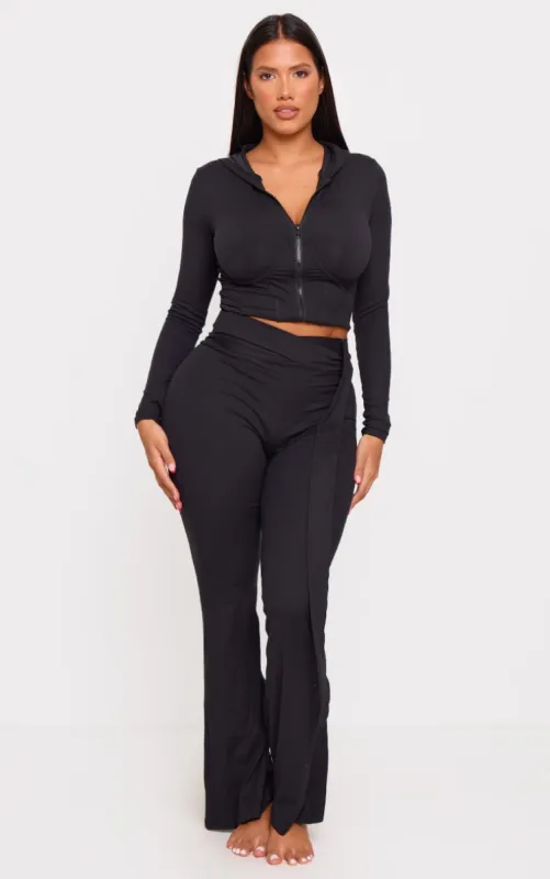 Shape Black Sculpt Wrap Drape Flared Trousers sold by Pretty Little Thing