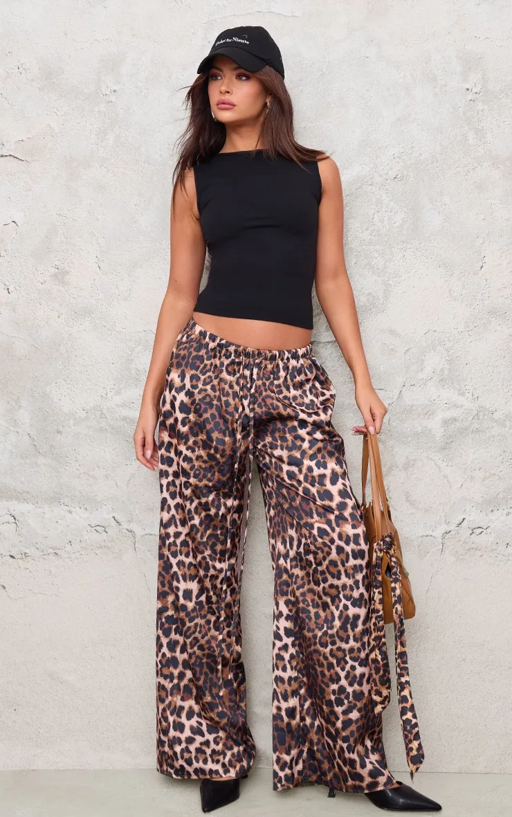 Leopard Premium Satin Low Rise Wide Leg Drawstring Trousers sold by Pretty Little Thing