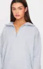 Grey Marl Zip Up Pocket Detail Sweatshirt sold by Pretty Little Thing