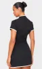 Black Key Hole Contrast Mini Dress sold by Pretty Little Thing