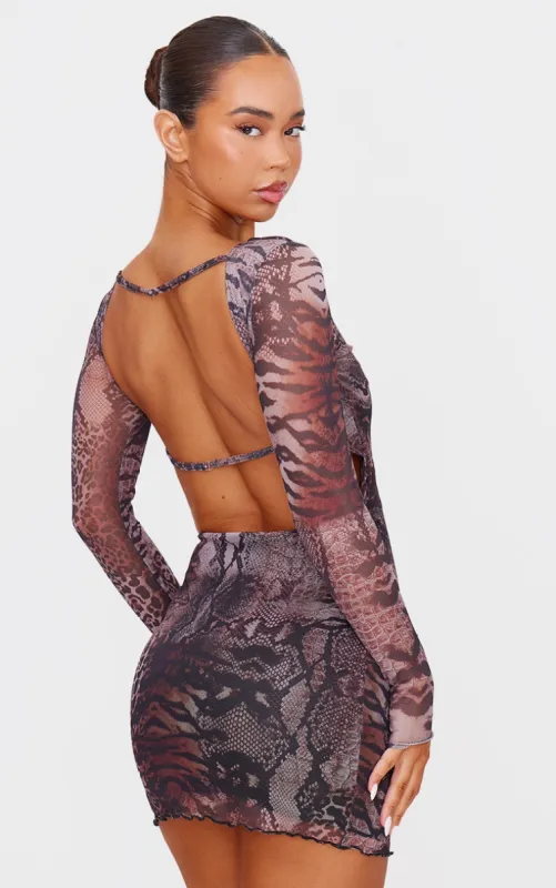 Brown Leopard Printed Long Sleeve Open Back Mini Dress sold by Pretty Little Thing