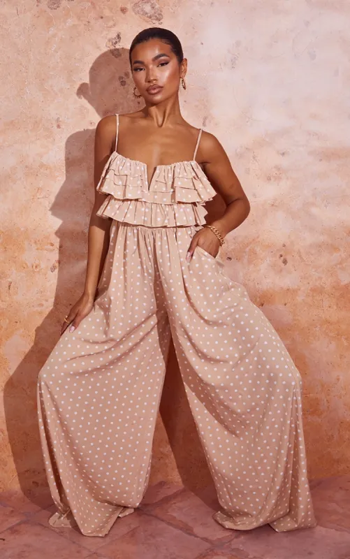Stone Polka Dot Strappy Ruffle Wide Leg Jumpsuit sold by Pretty Little Thing