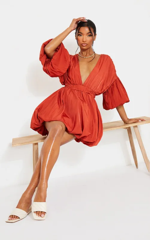 Terracotta Puff Sleeve Puffball Hem Shift Dress sold by Pretty Little Thing