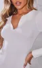 Cream Long Sleeve Ribbed Knitted Bodycon Mini Dress sold by Pretty Little Thing