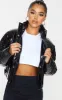 Petite Black Vinyl Puffer Jacket sold by Pretty Little Thing