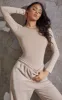 Basic Stone Crew Neck Long Sleeve Bodysuit sold by Pretty Little Thing