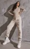 Basic Stone Crew Neck Long Sleeve Bodysuit sold by Pretty Little Thing
