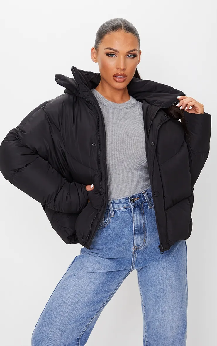 Black Nylon Oversized Curved Panel Wadded Puffer Jacket sold by Pretty Little Thing