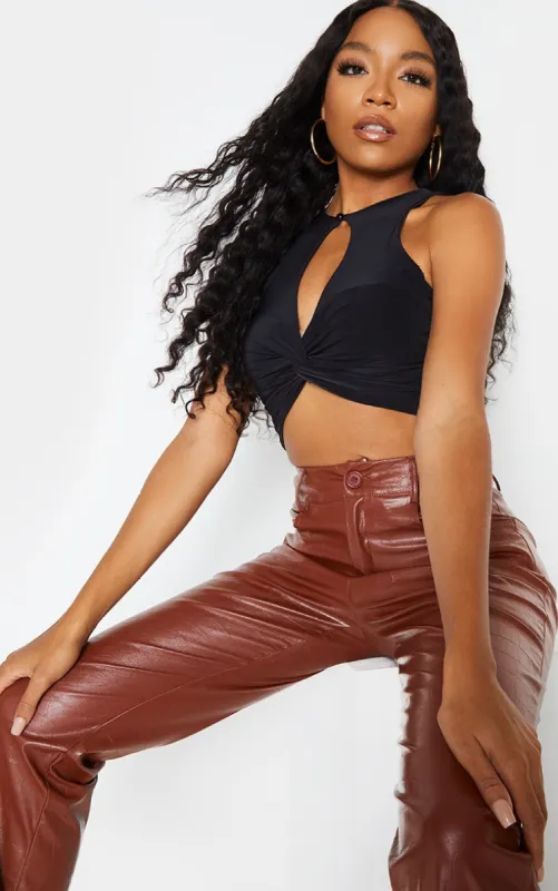 Black Slinky Cross Front Key Hole Crop Top sold by Pretty Little Thing