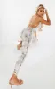 Shape Stone Tie Dye Slinky Ring Thong Detail Jumpsuit sold by Pretty Little Thing