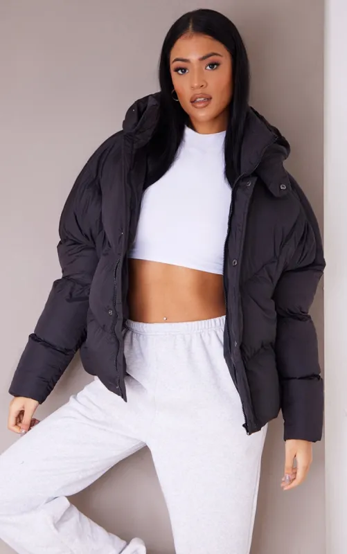 Tall Black Oversized Curved Panel Wadded Puffer Jacket sold by Pretty Little Thing