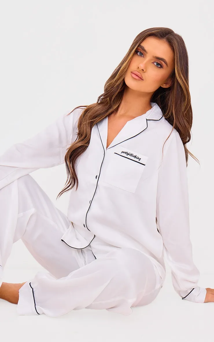 White Contrast Piping Satin Long PJ Set sold by Pretty Little Thing