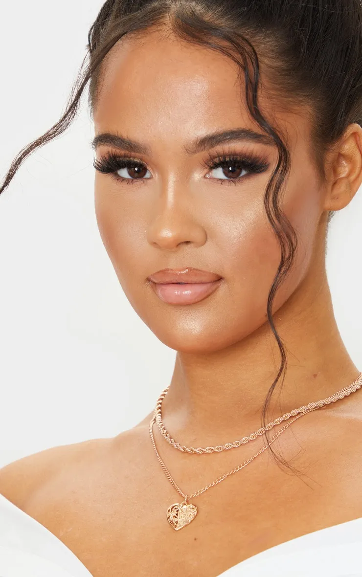 Gold Rope And Heart Charm Layering Necklace sold by Pretty Little Thing