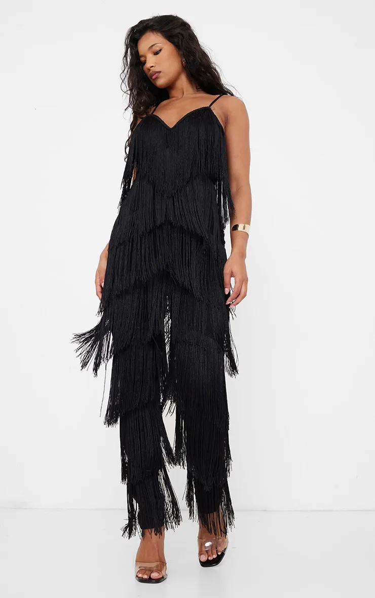 Black Tassel Plunge Jumpsuit sold by Pretty Little Thing