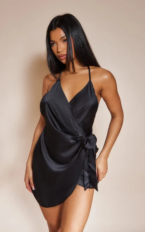 Black Satin Halterneck Wrap Bodycon Dress sold by Pretty Little Thing