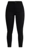 Petite Black High Rise Skinny Jeans sold by Pretty Little Thing