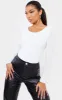 White Second Skin Long Sleeve Thong Bodysuit sold by Pretty Little Thing
