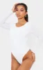 White Second Skin Long Sleeve Thong Bodysuit sold by Pretty Little Thing