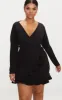 Plus Black Long Sleeve Ruffle Wrap Dress sold by Pretty Little Thing