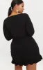 Plus Black Long Sleeve Ruffle Wrap Dress sold by Pretty Little Thing