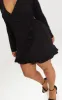 Plus Black Long Sleeve Ruffle Wrap Dress sold by Pretty Little Thing