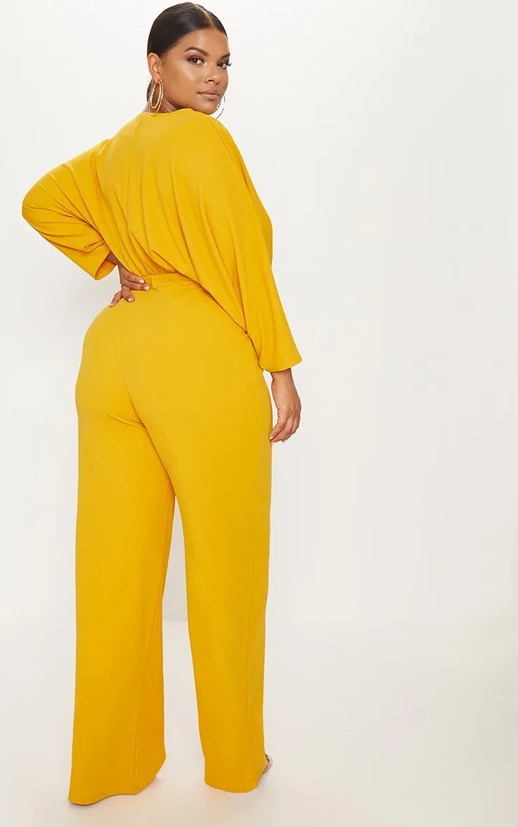 Plus Mustard Crepe Batwing Cut Out Jumpsuit sold by Pretty Little Thing product image thumbnail 2