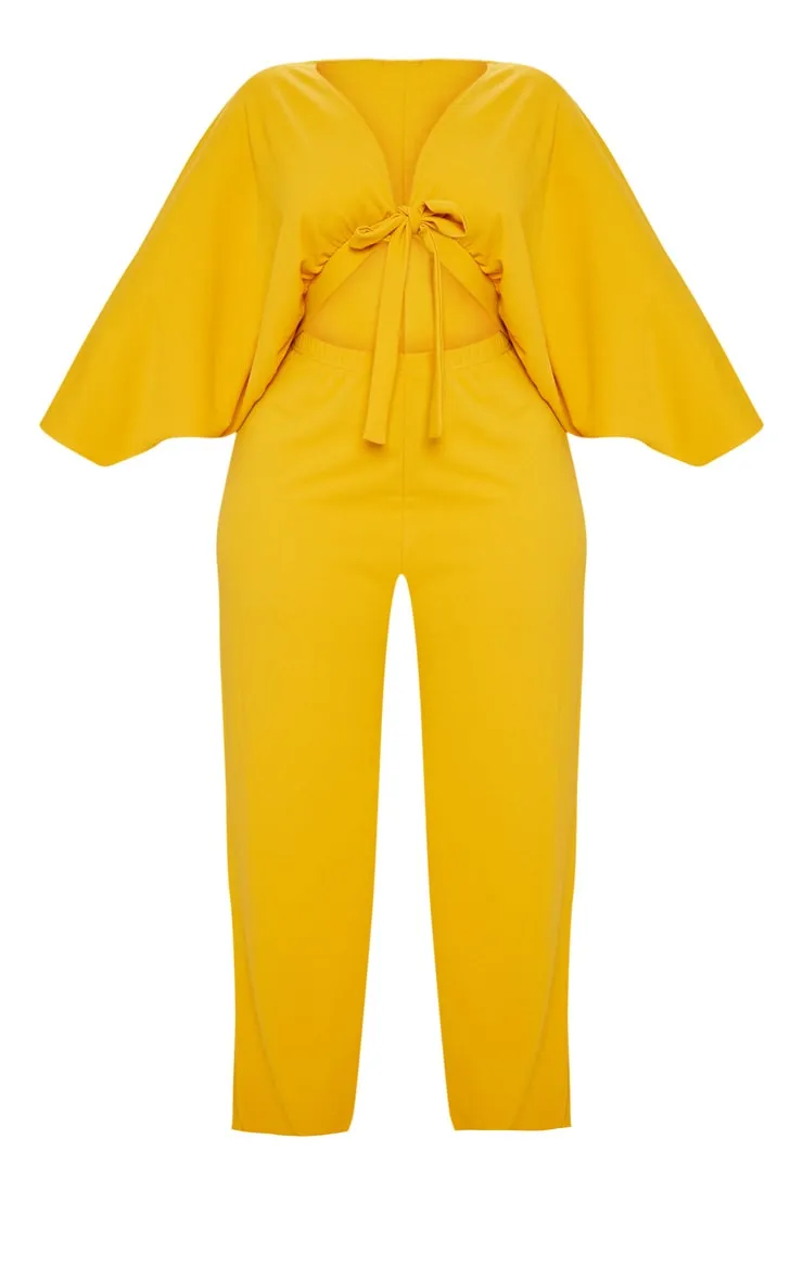 Plus Mustard Crepe Batwing Cut Out Jumpsuit sold by Pretty Little Thing product image thumbnail 3