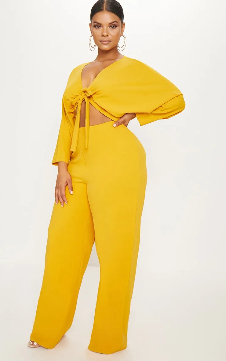 Plus Mustard Crepe Batwing Cut Out Jumpsuit sold by Pretty Little Thing product image thumbnail 4