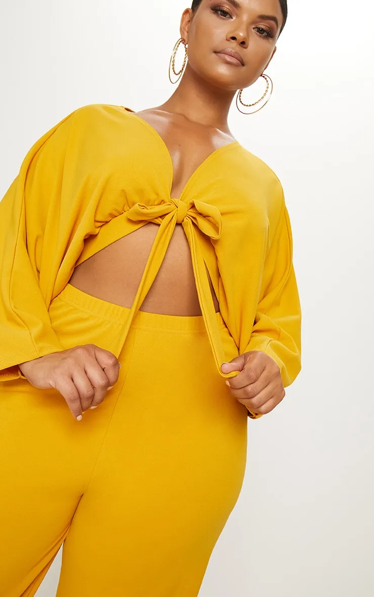 Plus Mustard Crepe Batwing Cut Out Jumpsuit sold by Pretty Little Thing product image thumbnail 5