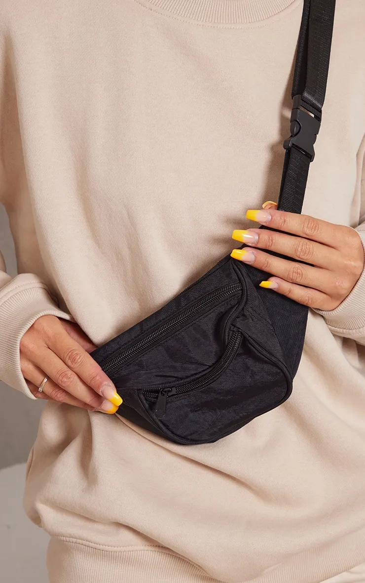 Black Small Bum Bag sold by Pretty Little Thing