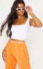 Basic White Crop Top sold by Pretty Little Thing