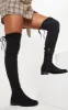 Black Flat Over The Knee Boot sold by Pretty Little Thing