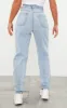 PRETTYLITTLETHING Light Blue Wash Knee Rip Mom Jeans sold by Pretty Little Thing