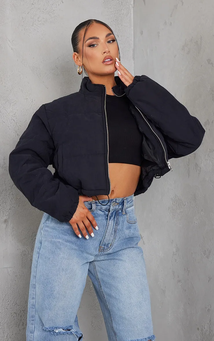 Black Super Cropped Peach Skin Puffer sold by Pretty Little Thing