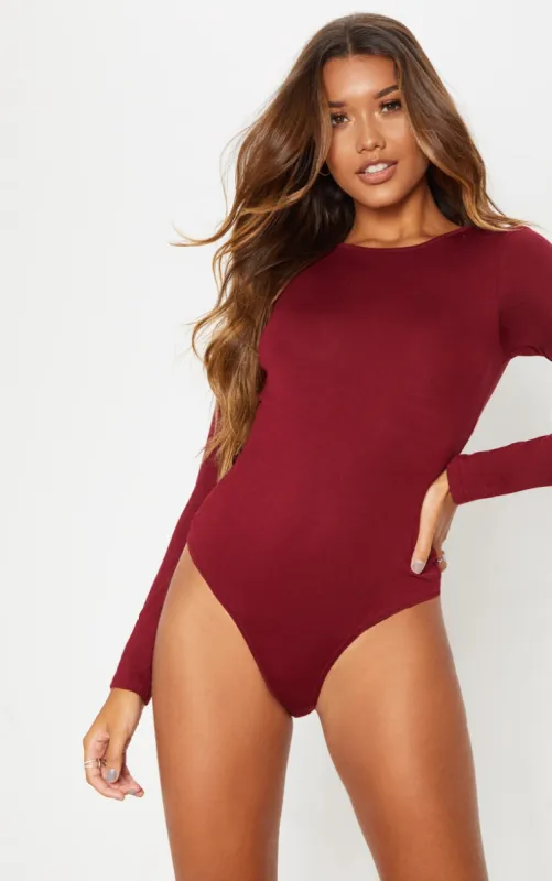 Basic Burgundy Crew Neck Long Sleeve Bodysuit sold by Pretty Little Thing