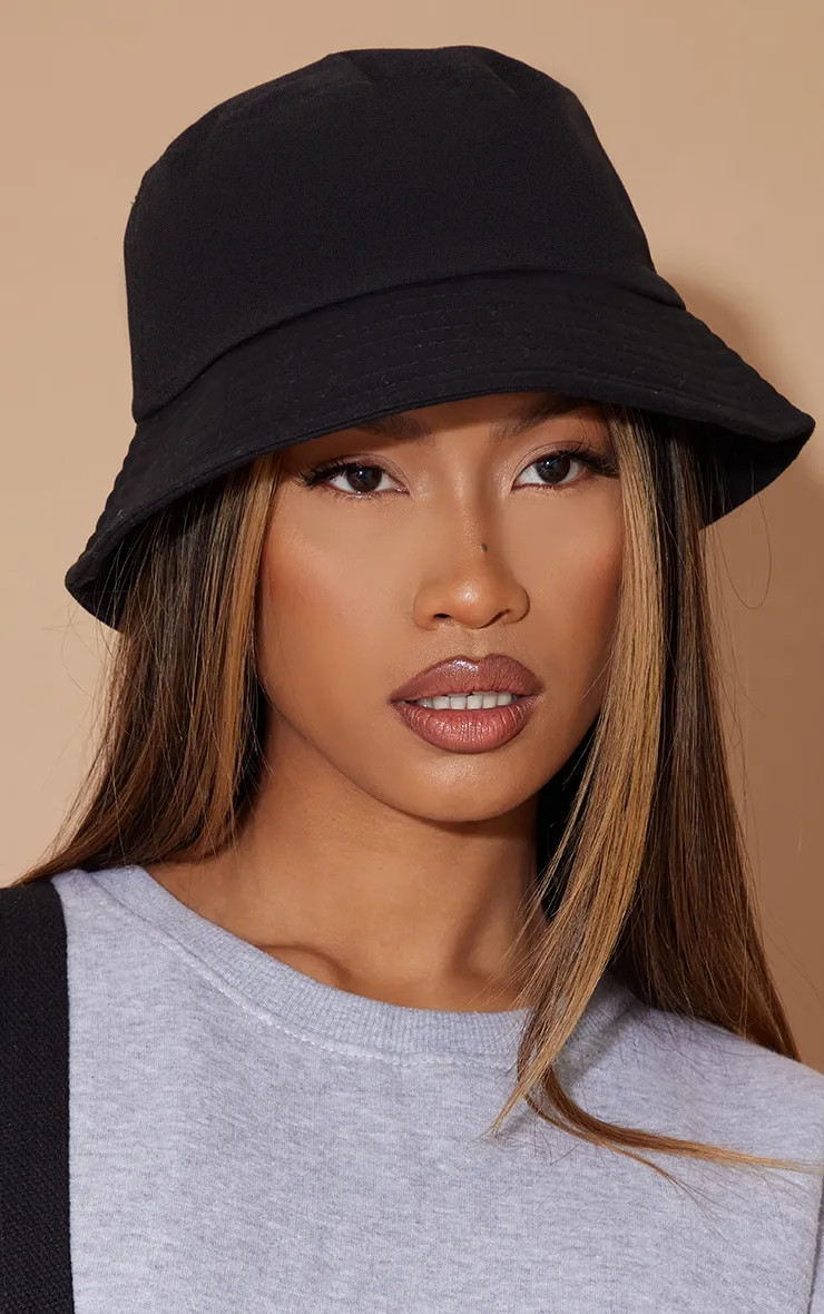 Plain Black Bucket Hat sold by Pretty Little Thing