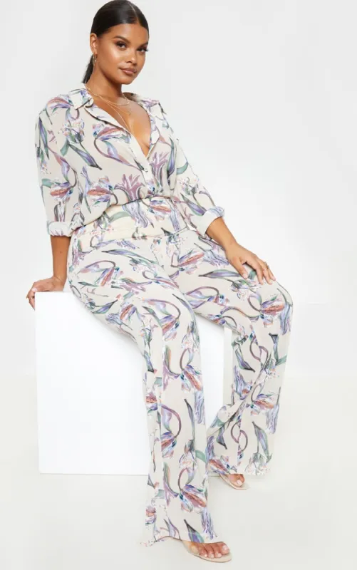 Plus Dusty Pink Floral Wide Leg Trousers sold by Pretty Little Thing