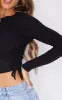 Black Jersey Ruched Side Long Sleeve Crop Top sold by Pretty Little Thing