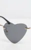 Black Heart Shaped Sunglasses sold by Pretty Little Thing