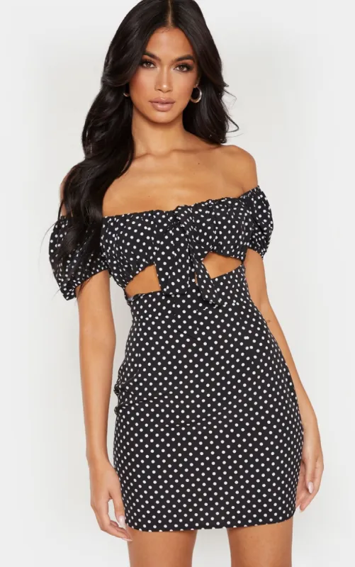Black Polkadot Bardot Puff Sleeve Tie Front Bodycon Dress sold by Pretty Little Thing