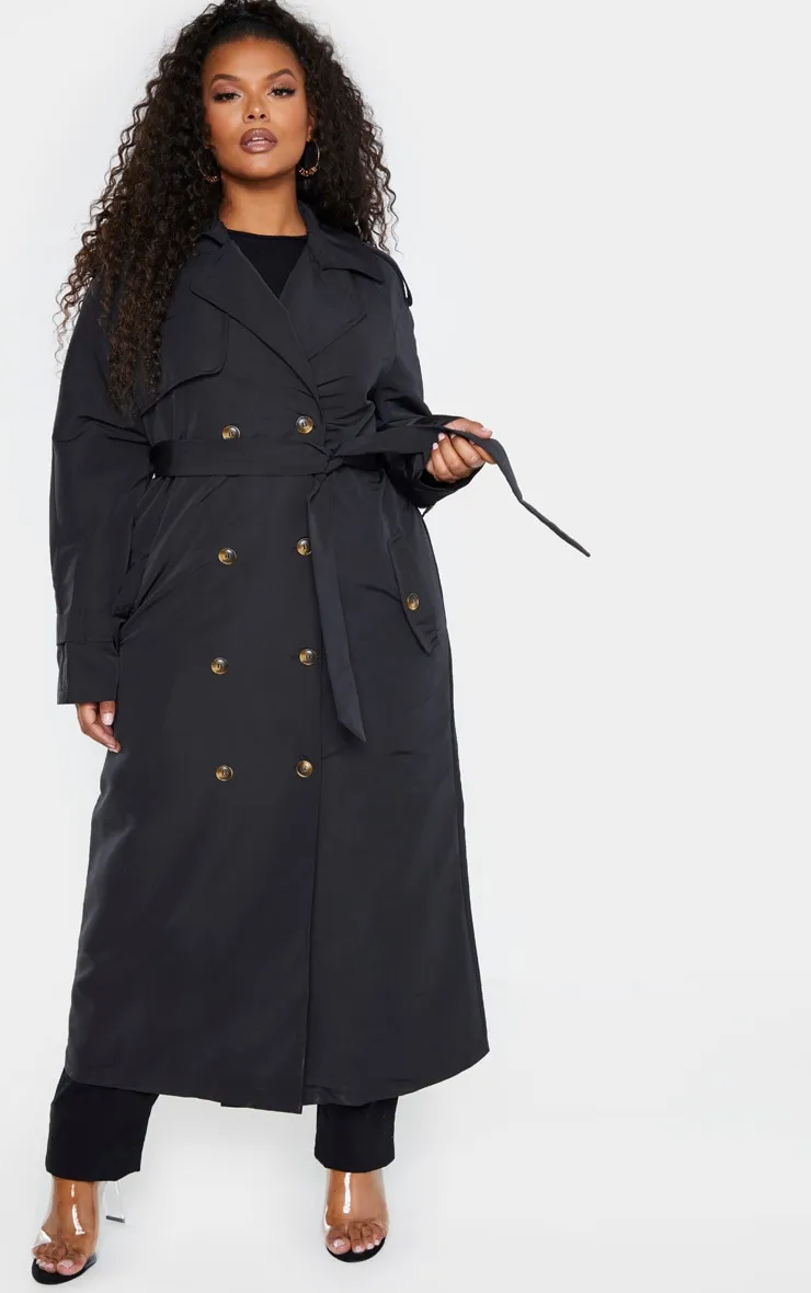 Plus Black Oversized Button Down Trench Coat sold by Pretty Little Thing