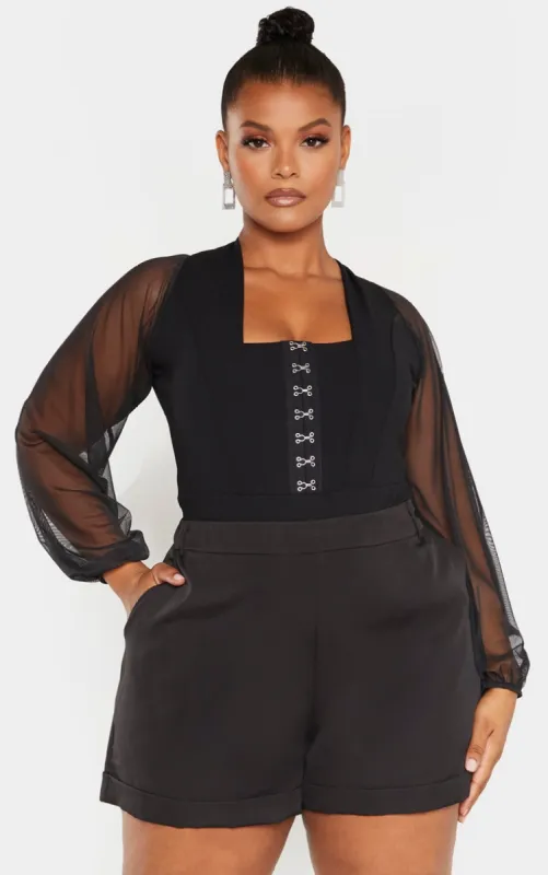 Plus Black Eyelet Detail Mesh Sleeve Bodysuit sold by Pretty Little Thing