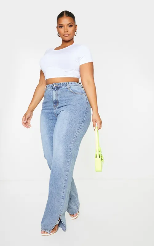 Plus Mid Wash Split Hem Jeans sold by Pretty Little Thing