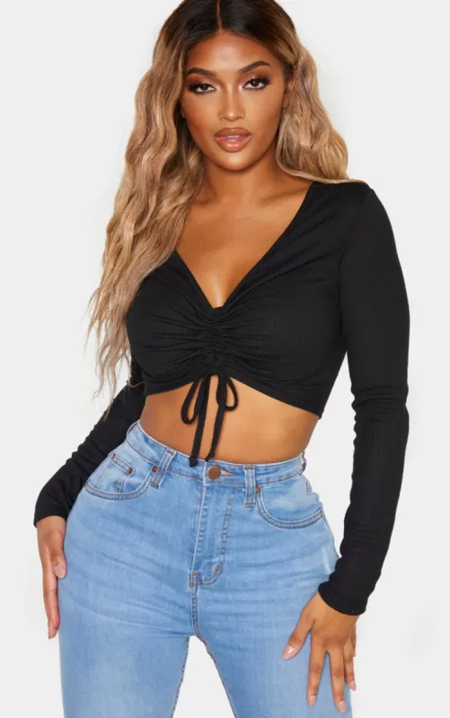 Shape Black Ribbed Long Sleeve Ruched Front Crop Top sold by Pretty Little Thing