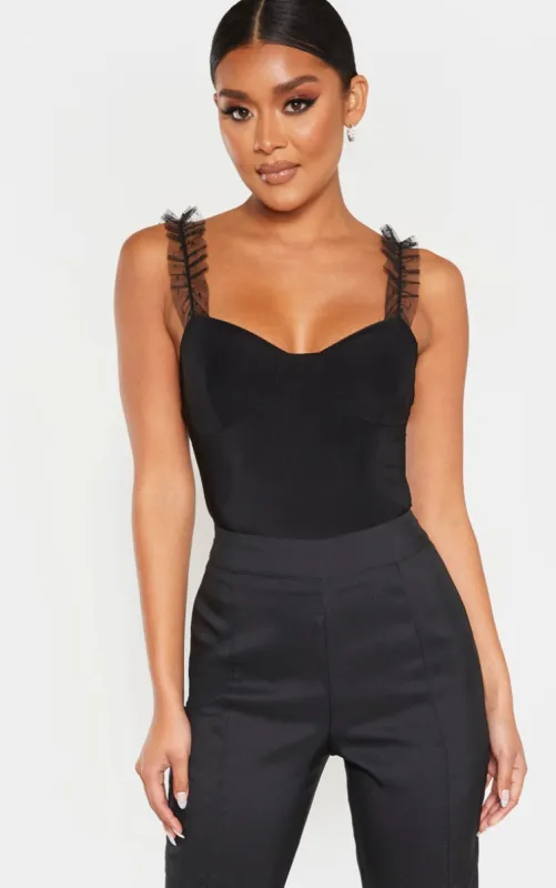 Black Dobby Mesh Frill Strap Slinky Bodysuit sold by Pretty Little Thing