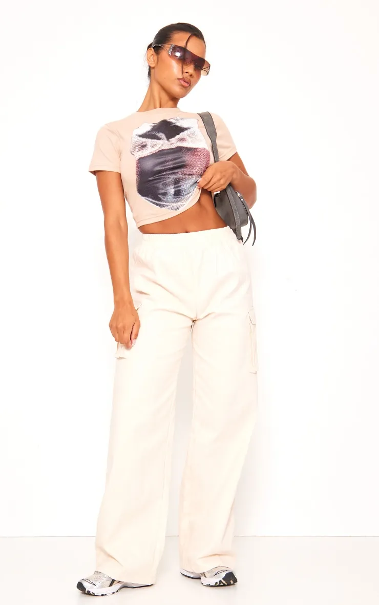 Cream Wide Leg High Waisted Cargo Trousers sold by Pretty Little Thing