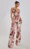 Multi Floral Print Halterneck Wide Leg Jumpsuit sold by Pretty Little Thing